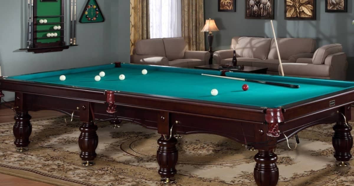 Russian pyramid table with white balls in a home games room